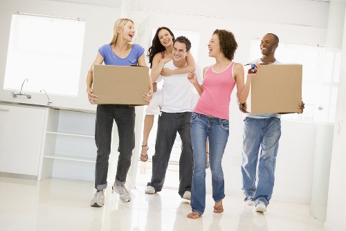 Packed boxes and furniture ready for transport in Upton Park