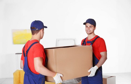 Packed boxes and wrapped furniture ready for a domestic relocation