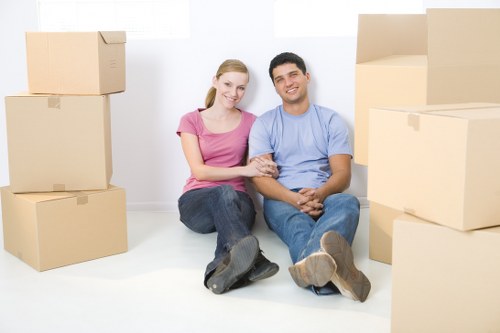 Van removal team preparing items safely for transport
