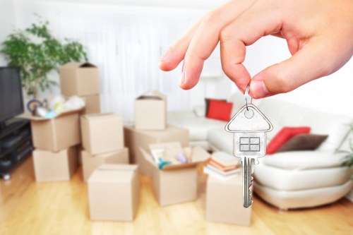 Commercial removal service preparing office items for transport