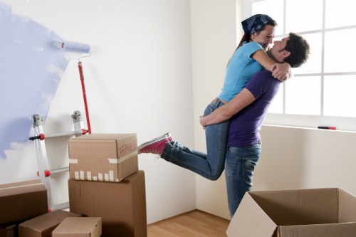 Packing and loading items into a moving van in East London