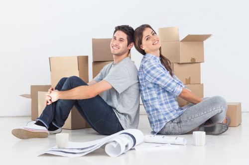 Staff carrying out careful manual handling during a move