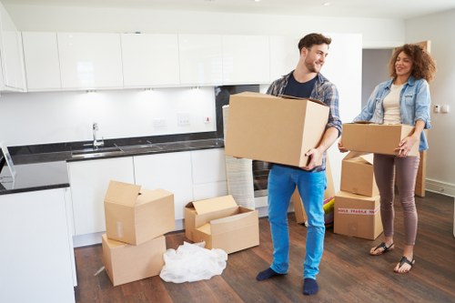 A local moving service handling household items carefully