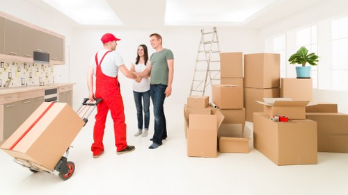 Packed boxes and furniture ready for local house removals