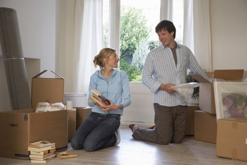 Packing boxes and furniture for a house move in East London