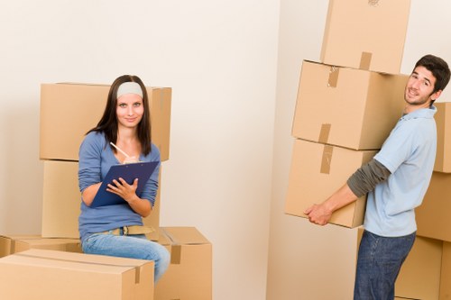Boxes and furniture prepared for a flat move in East London